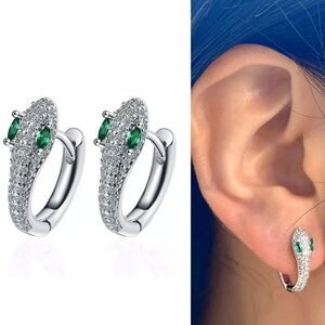 - The Serpentine Earring in 925 silver and cubic zirconia